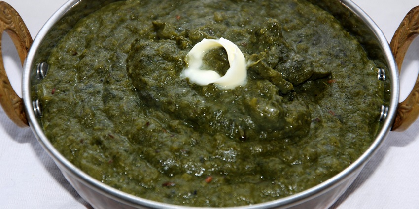 Snapshot of the Saag served in the Kadhai with the Roti made of Flour mixture of Corn