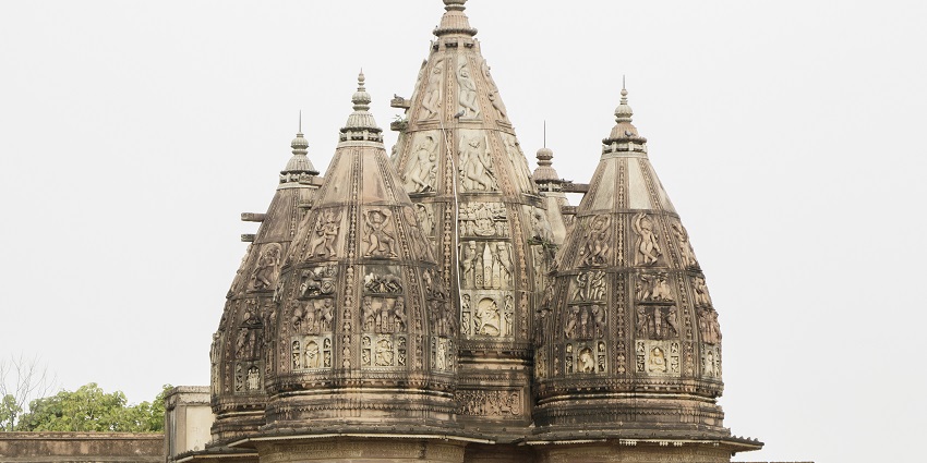 An image showcasing the serene surroundings of Sati Anusuya Ashram in Chitrakoot.