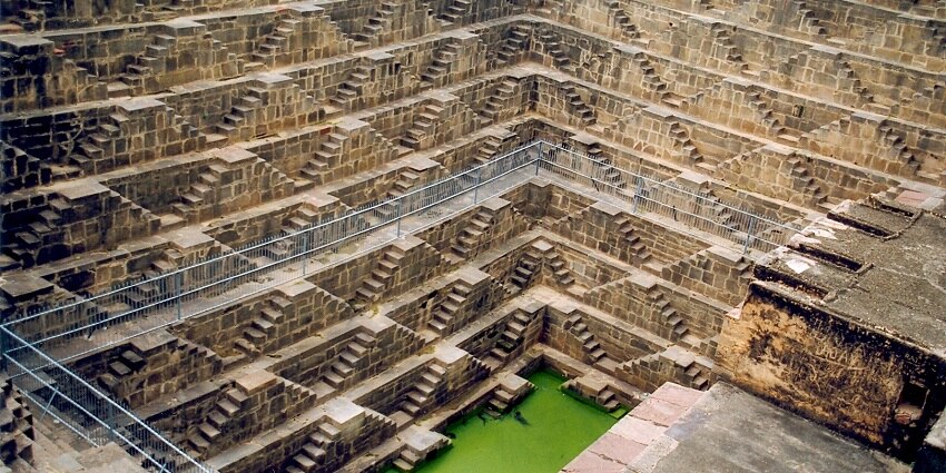Sati Bawri step-well, featuring an intricate stonework and a rich cultural history.