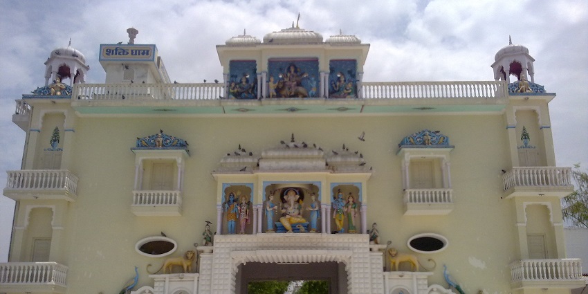 Amravati temple offers colourful deities, a peaceful atmosphere, and festive decorations.