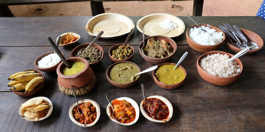 Savour the traditional Goan food cooked with spices and vegetables grown here.