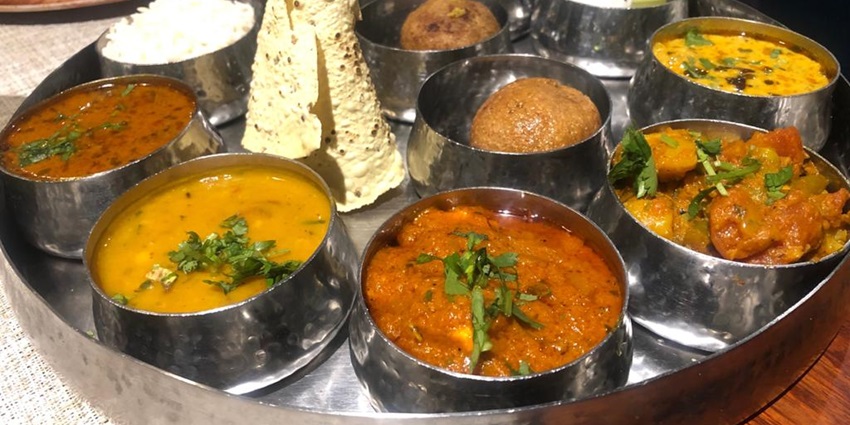 Enjoying local food is one of the best things to do in Alwar for tourists