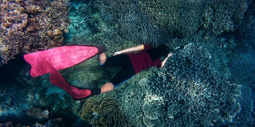 Scuba diving is one of the best water sports in Thailand for travellers to experience.