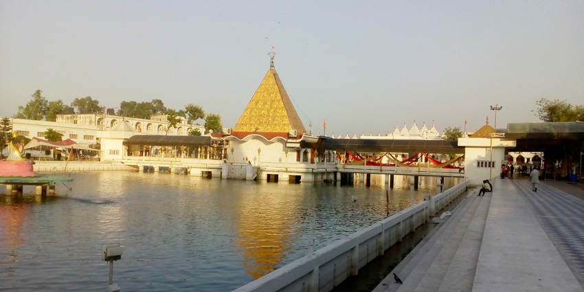 Views of the holy pond in the complex of a devi temple in Jalandhar