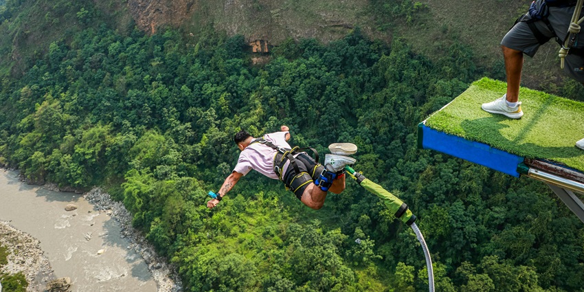 A person at the best bungee jumping location in Pokhara, capturing the excitement of the extreme sport.