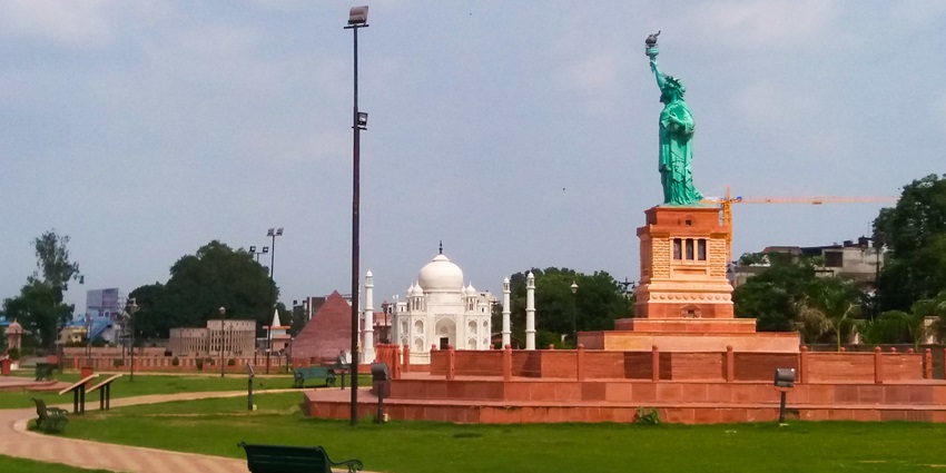 Replica of world wonder structure in Seven Wonders Park, Kota, under open sky.