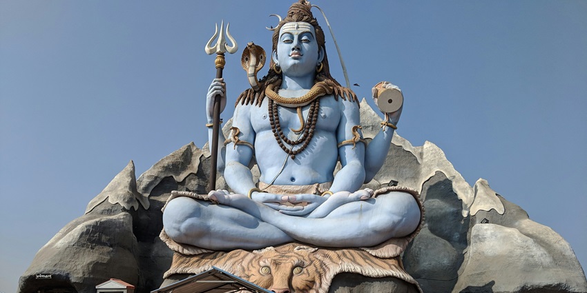 A majestic statue of Lord Shiva at the Shani Dev Mandir, a spiritual site in Punjab.