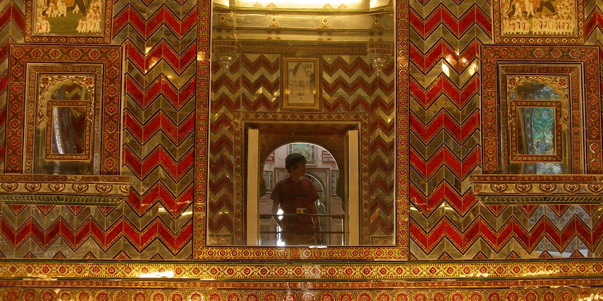 Sheesh Mahal, one of the places to visit in Udaipur for couples dazzles with regal architecture.