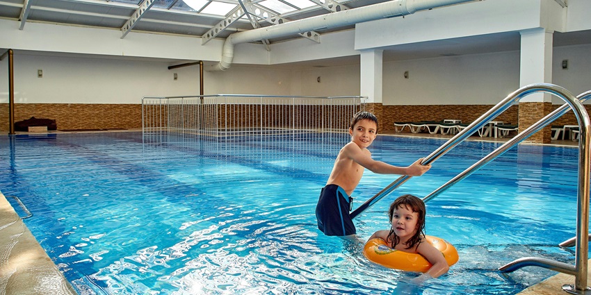 An image of Shell City Water Park, highlighting its exciting water slides and lively atmosphere.