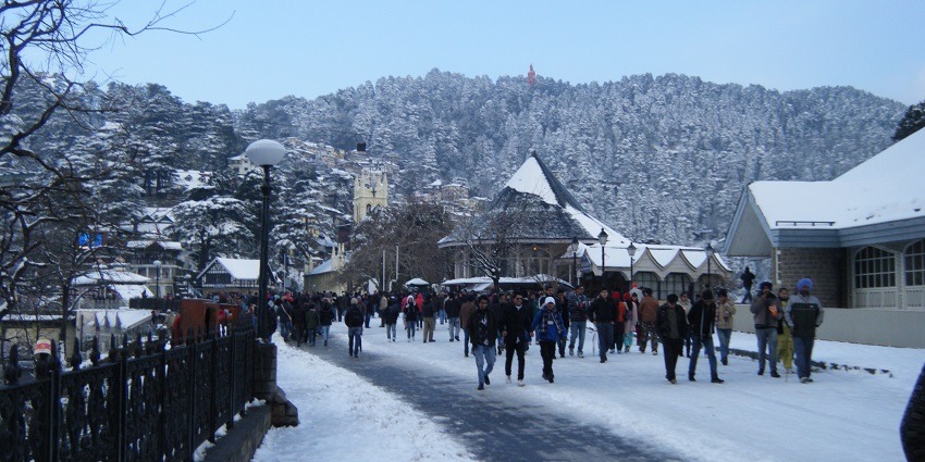 The Ridge in Shimla, bustling with visitors, featuring colonial architecture and scenic mountain views