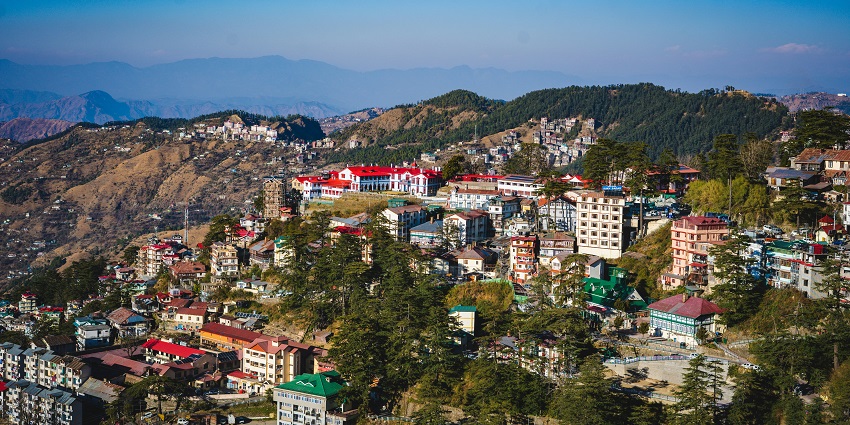 Aerial view of Shimla city during day time - mountains and building surrounded