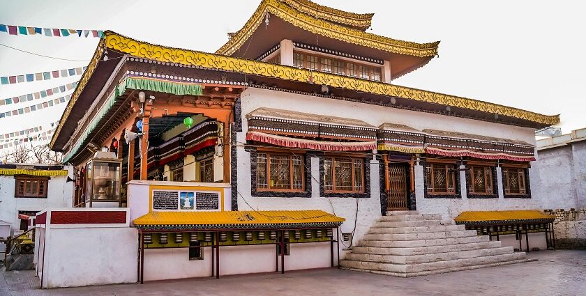 A stunning view of a monastery in Himachal Pradesh with colourful architecture in the day.