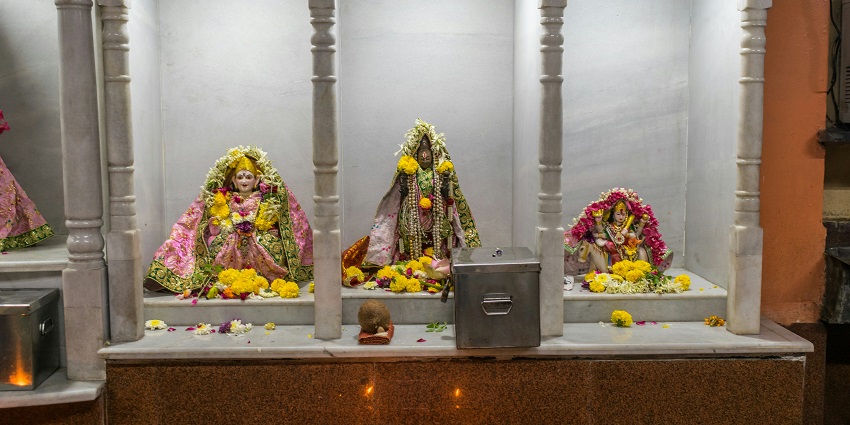 An inside view of the Shitala Mata spiritual hub featuring figurines of different Gods.