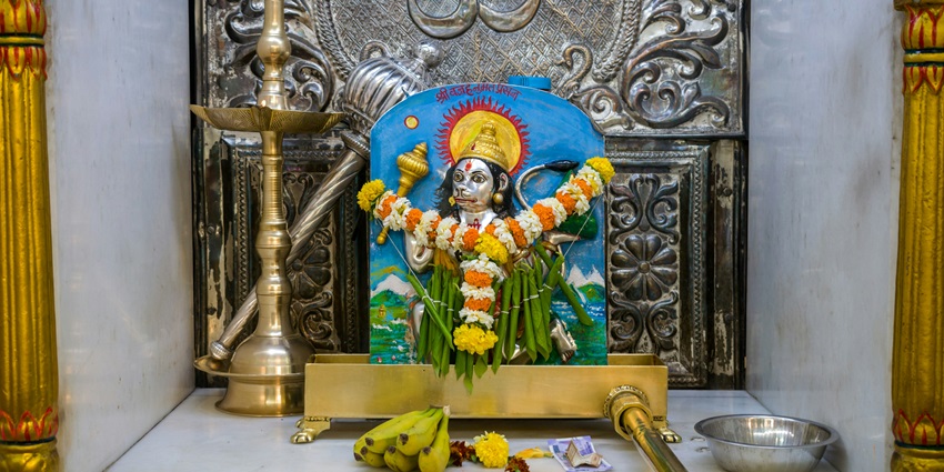 An inside view of Hanuman Temple in Rajasthan featuring the statue of Lord Hanuman.