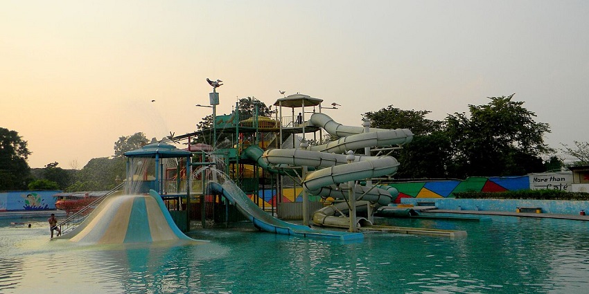 Outdoor water park in Kalindi Kunj, Delhi with slides, pools and greenery