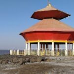 Image of Shree Stambheshwar Mahadev Temple, submerged at high tide, honors Shiva