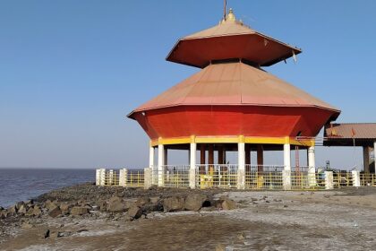 Image of Shree Stambheshwar Mahadev Temple, submerged at high tide, honors Shiva