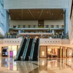 Image of a shopping mall inside with escalators - shop till you drop at shopping malls in Amritsar