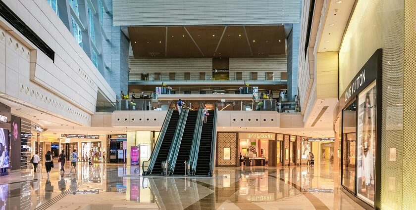 Image of a shopping mall inside with escalators - shop till you drop at shopping malls in Amritsar