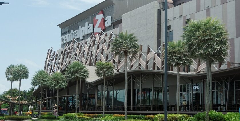 Shoppers exploring a modern shopping mall in Surat with bright interiors.