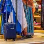 A glimpse of colourful apparel beautifully lined inside a store with vibrant dupattas.