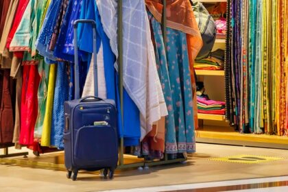 A glimpse of colourful apparel beautifully lined inside a store with vibrant dupattas.