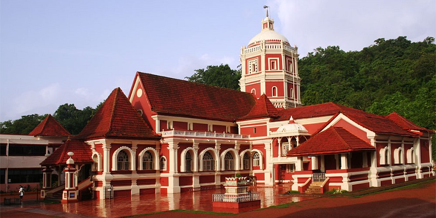 Shantadurga Temple near Ponda fort, showcasing its intricate architecture and vibrant surroundings.