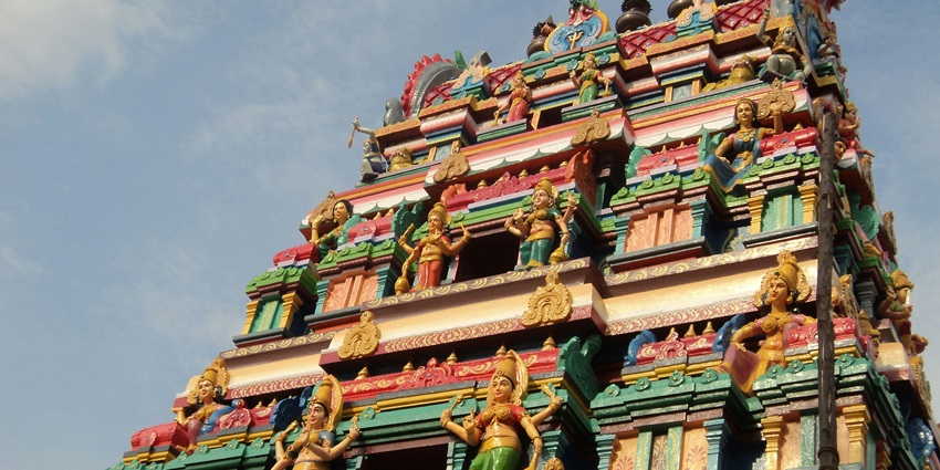 Majestic Swaminarayan Mandir Vadtaldham with detailed carvings and domed towers.