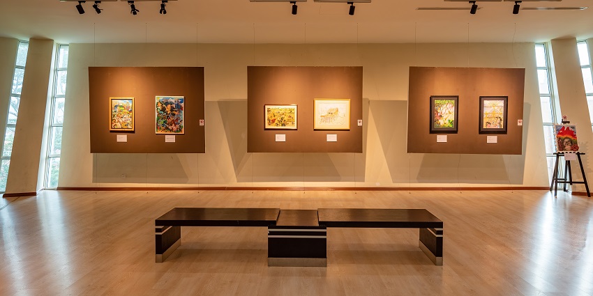 Halls of the gallery featuring diverse artworks and community-focused events