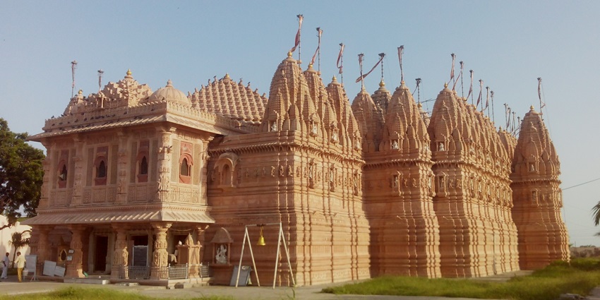 A serene view of Shri Digambar Jain Siddha Kshetra, showcasing its intricate architecture