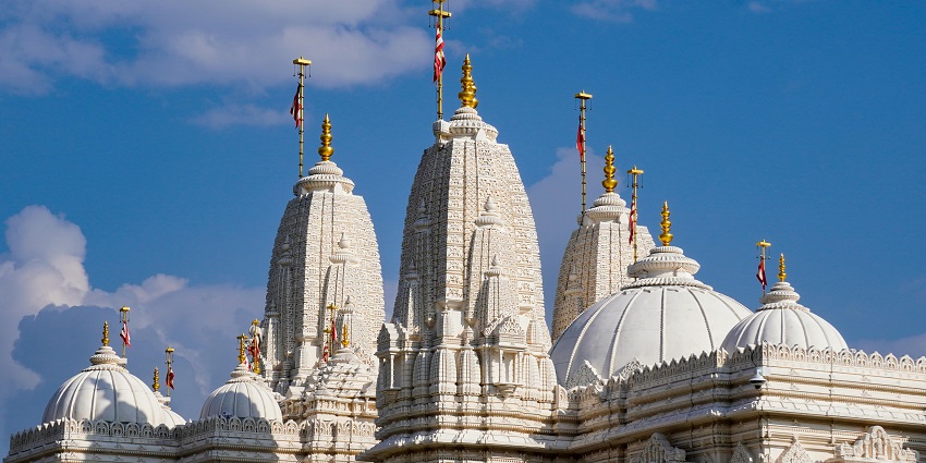 A multi-tiered sacred site set against a stunning backdrop is a must-visit in the region.