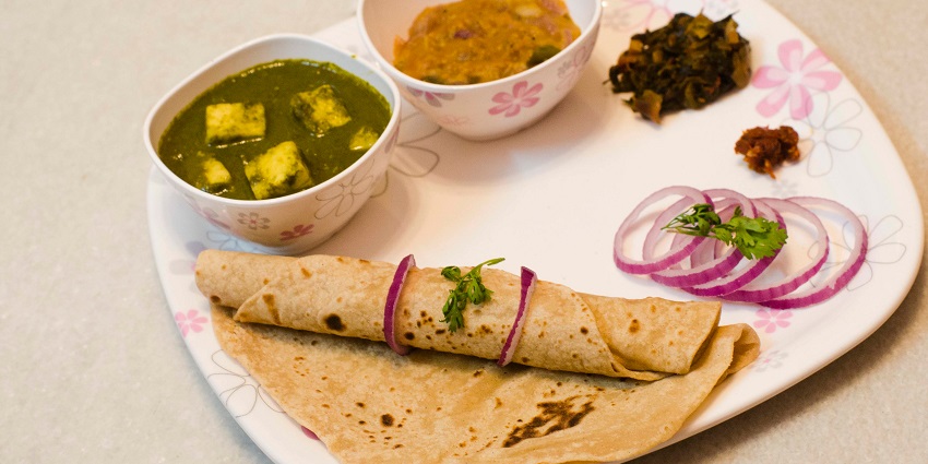 Dhaba style roti and sabji served with a pinch of tanginess from lemon