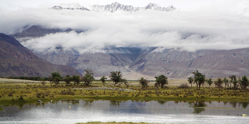 Panoramic view of the beautiful Shyok River flowing through the valley of Himalaya.