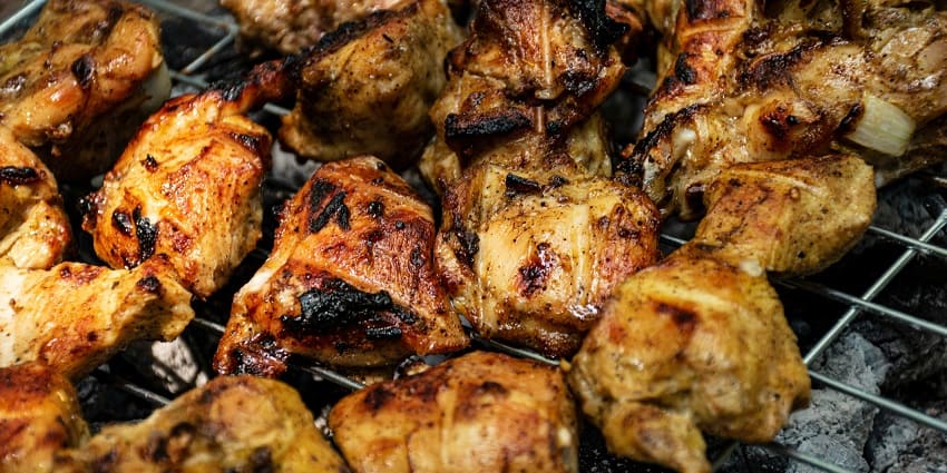 Sikander Bhai's Stall serving some sizzling chicken kebabs and mutton seekhs.