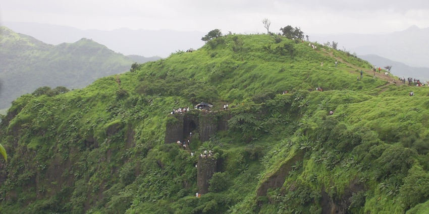 Sinhagad Fort offers historical ruins and panoramic views for adventurers.