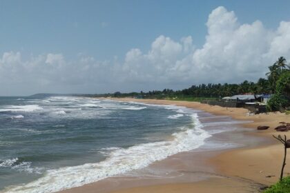 A glimpse of the leisure hub of Goa featuring pristine golden sands and shimmering waters.