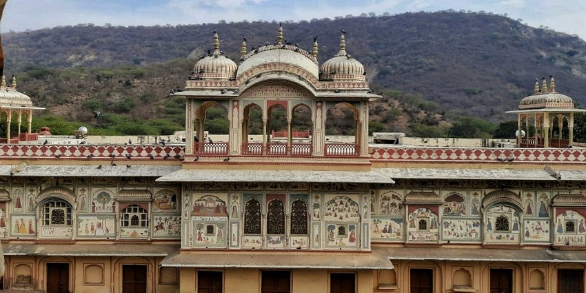 The Sisodia Rani Garden And Palace features intricate architecture and fountains