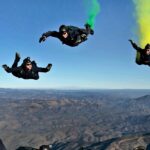 Group of skydivers soaring above Deesa, one of the popular places for skydiving in Ahmedabad