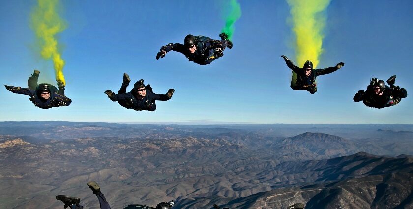 Group of skydivers soaring above Deesa, one of the popular places for skydiving in Ahmedabad