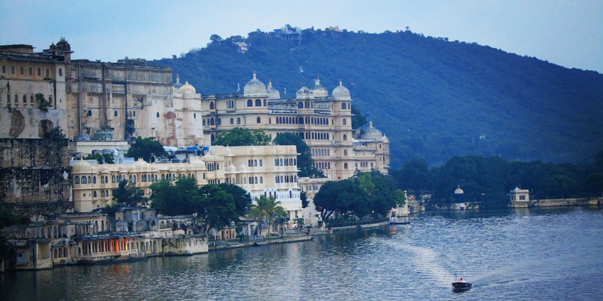 Enchanting night view of Ambrai Ghat by Lake Pichola, sparkling with serene beauty.