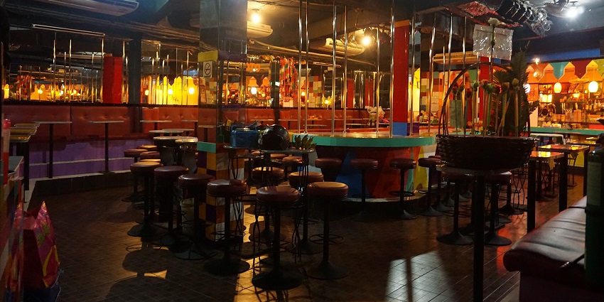A nightclub in Nana Plaza Bangkok with a cosy ambience and relaxed seating