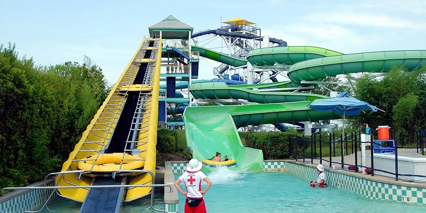 A picture of a water park with a tall slide, one of the best places to visit in Hisar