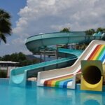 The Splash Water Park Ahmedabad features various high-speed slides and water rides