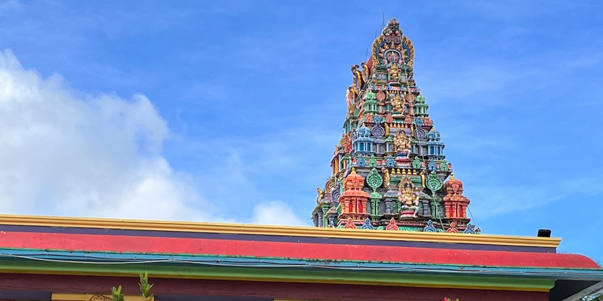 Intricate architecture of Sri Hathiramji Mutt, with the clear blue sky in the background