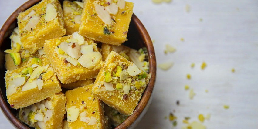 A variety of sweets available at Sri Krishna Sweets along with the best food in Tirumala