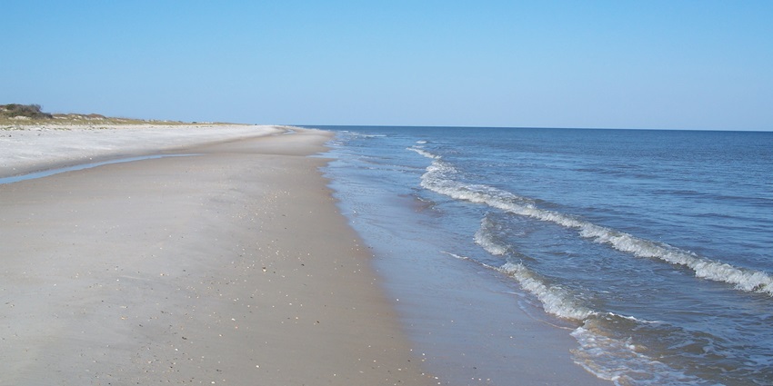 St. George Island is a serene island near Goa, ideal for snorkelling, diving, and dolphin spotting.