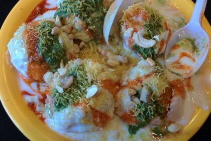 Chaat served with mint and tamarind chutney, sprinkled with dahi and sev