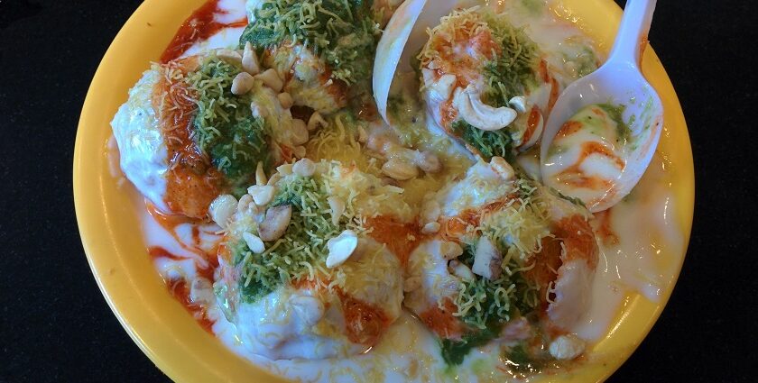 Chaat served with mint and tamarind chutney, sprinkled with dahi and sev