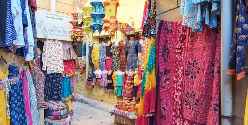 Vibrant street shopping in Ahmedabad selling traditional clothes and handicrafts.