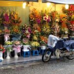 Explore shopping in Hanoi in the street market with local products on sale.